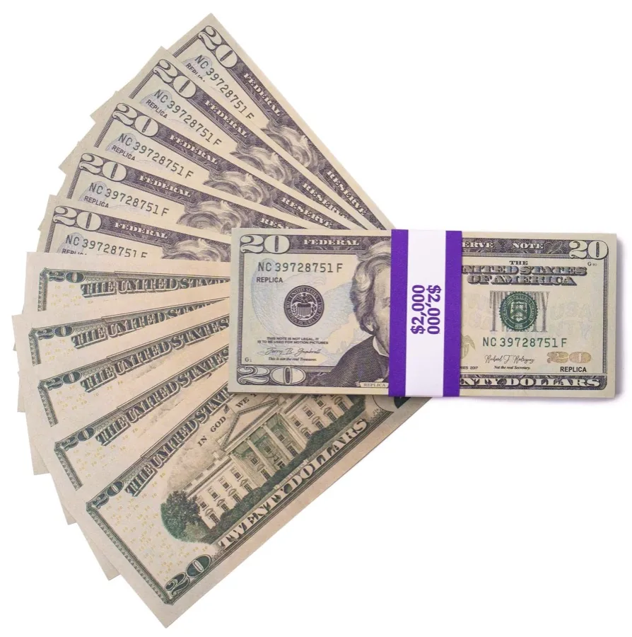 Replica $20 stack at camera distance — reads real